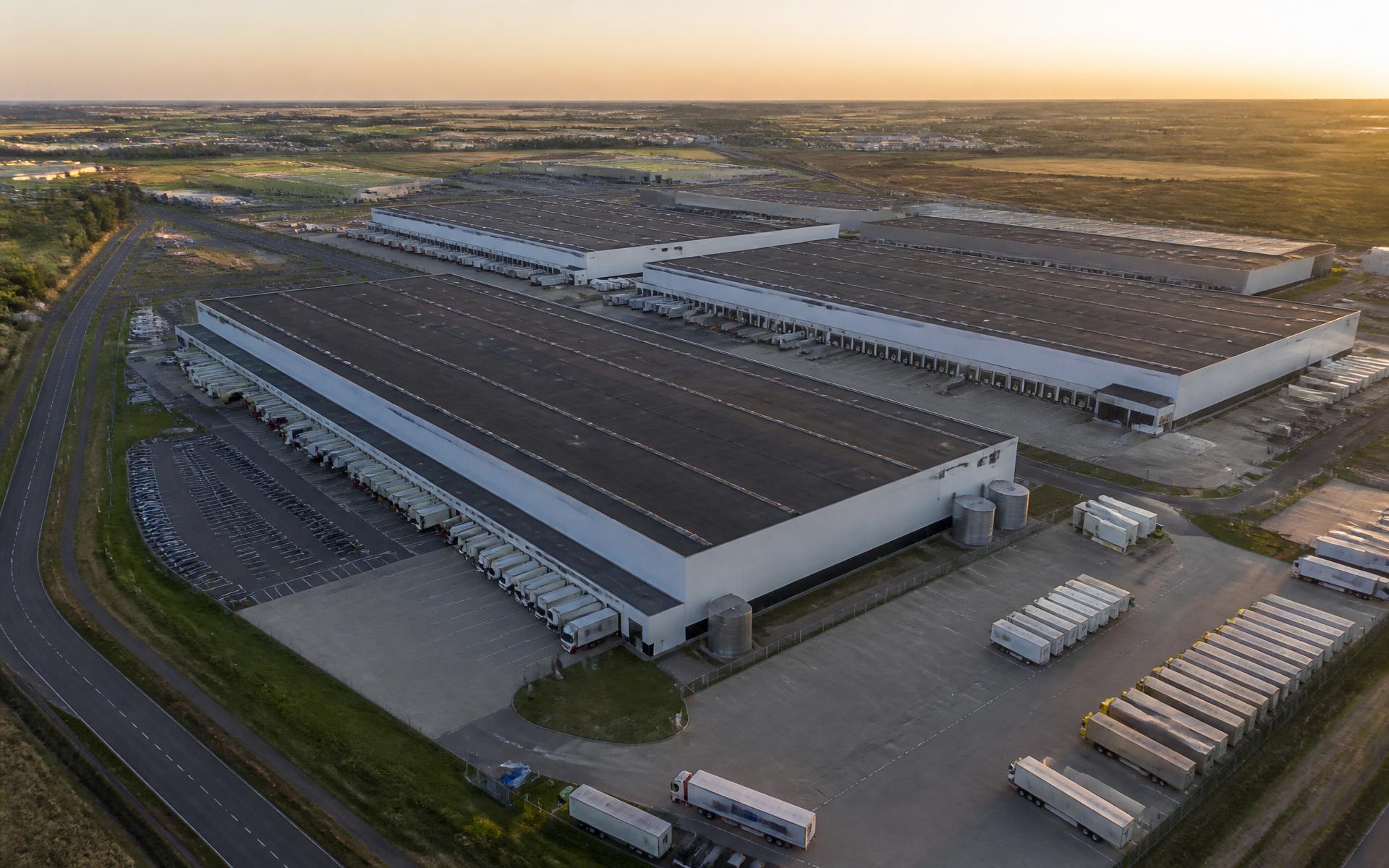 Aerial view of a modern logistics park at golden hour
